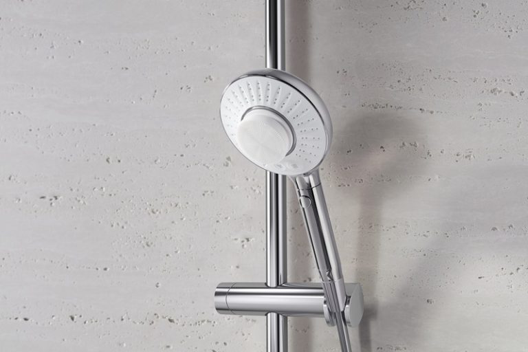 Kohler SpaViva Handshower on a concrete wall.