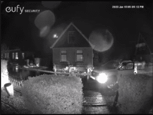 White car on a eufy security camera feed.