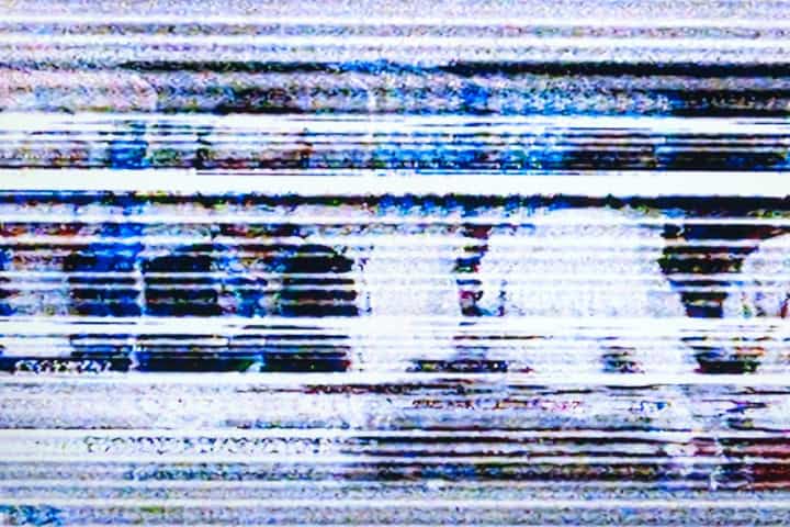TV with heavy signal distortion.