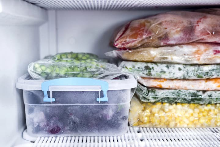 Freezer with various items in it.