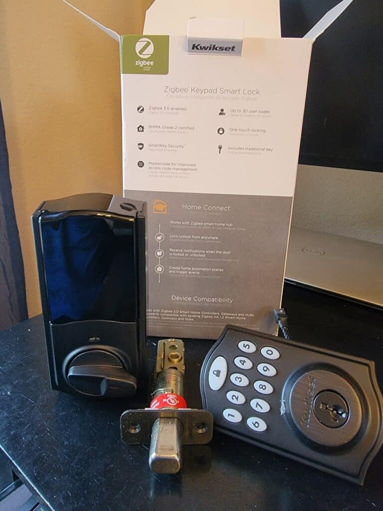 Kiwkset 914 Zigbee Smart Lock opened and back of box
